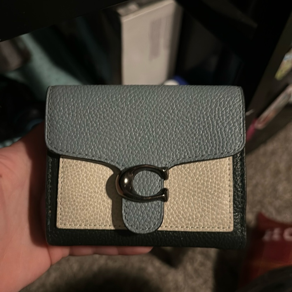 Slightly used, amazing condition coach light blue and black wallet